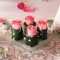 Tischschmuck auf Glasschale mit Rosen